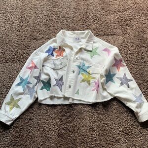 Brand new with tags crop white denim jacket with rhinestone stars !